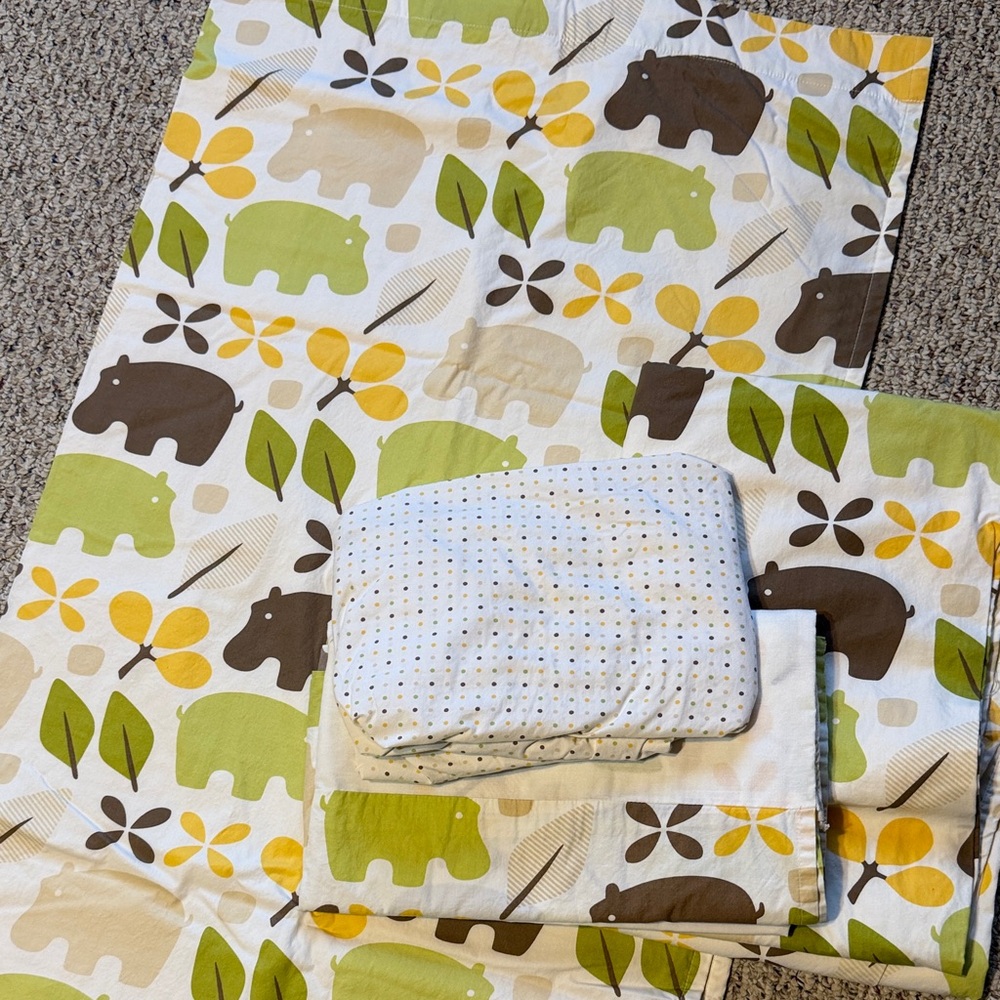 Hippo Print Baby Bedding Set includes crib sheet, crib skirt and curtain panels